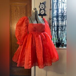 The red puff dress by Selkie